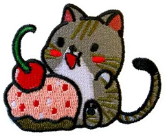 Chat et gâteau à la cerise
